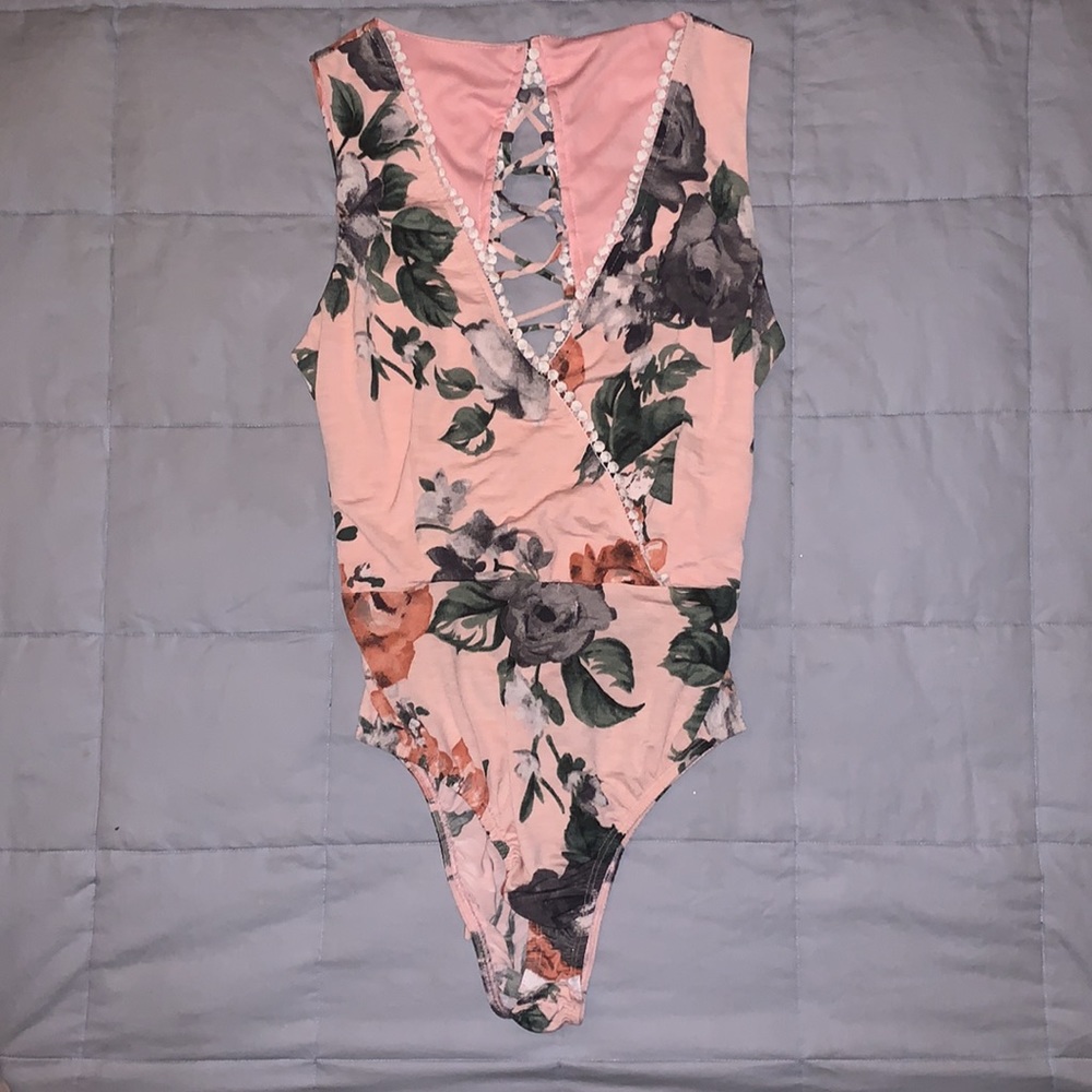 Beautiful tie up back onesie, size small